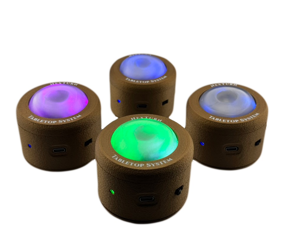 Four NexTurn tabletop nodes glowing on a table